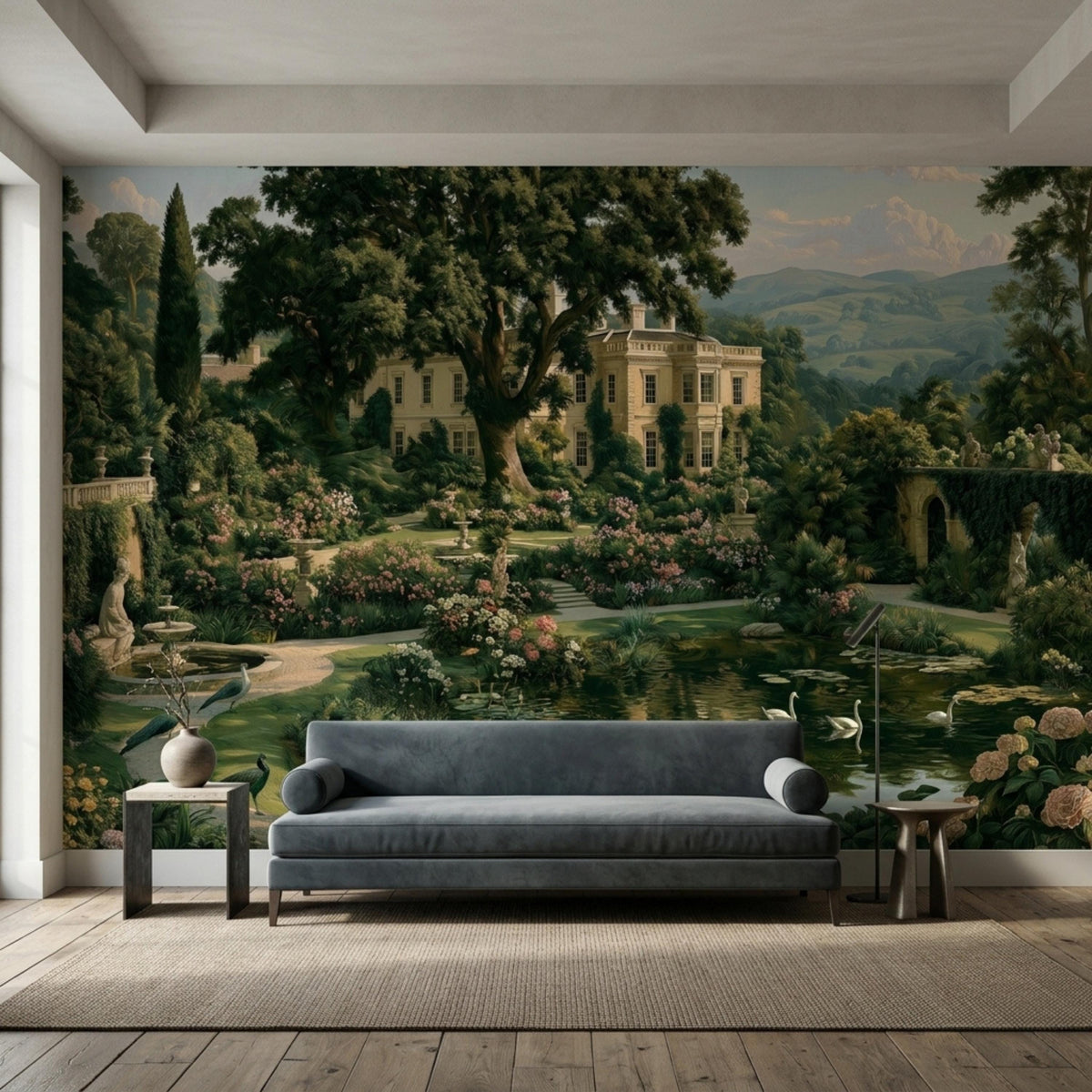A living room featuring a large dark academia landscape wall mural depicting an English manor, pond, and gardens, with a grey sofa and wooden side table.