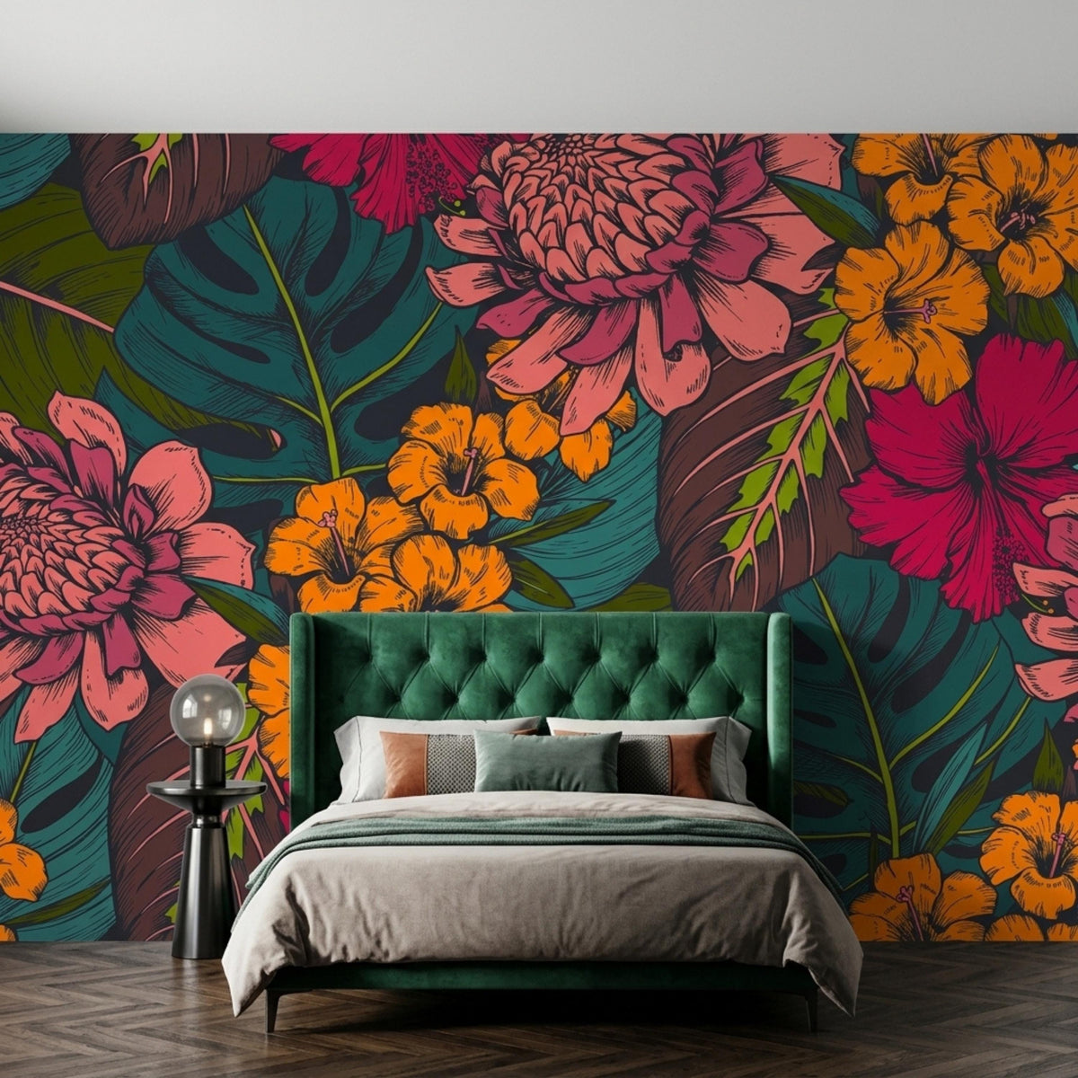 A bedroom features a green tufted bed and a tropical floral accent wall with large pink and orange botanical prints.