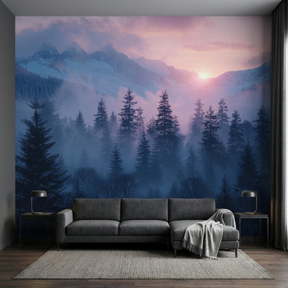 A gray sectional sofa and a rug sit against a large wall mural depicting a purple sunset over snow-capped mountains and pine trees.