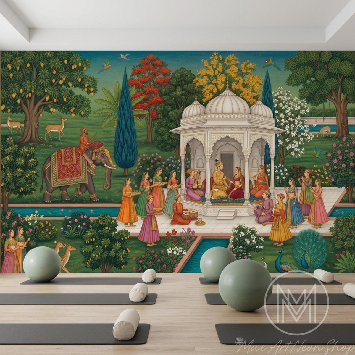An Indian Mughal miniature art wall mural is mounted above several yoga mats and grey exercise balls arranged on a wooden floor.