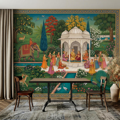 An Indian Mughal miniature art wall mural is framed by a patterned border, with a dining table, chairs, and curtains visible in the foreground.