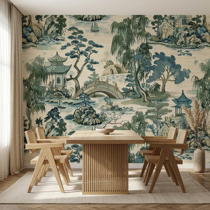 A dining space with a wooden table and chairs set against an Asian-inspired scenic wall mural.