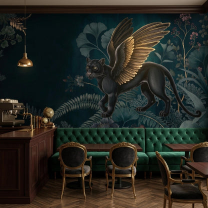 A cafe interior with a dark green wall mural featuring a winged black panther and botanical elements, a dark wooden counter, and green velvet banquette seating.