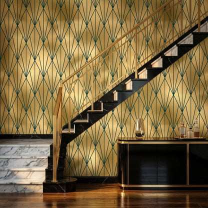 A staircase with black marble treads and a gold railing ascends alongside a gold and dark green art deco geometric wallpaper accent wall.