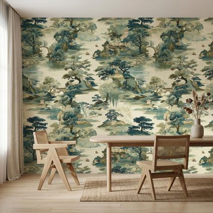 A wooden dining table and chairs sit on a woven rug against a wall covered in Chinoiserie landscape wallpaper.