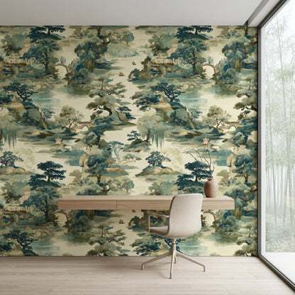 A desk and office chair are positioned against a Chinoiserie landscape wallpaper mural next to a window showing bamboo.