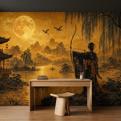 A desk and stool sit on a wood floor in front of a golden Japanese archer landscape wallpaper mural.