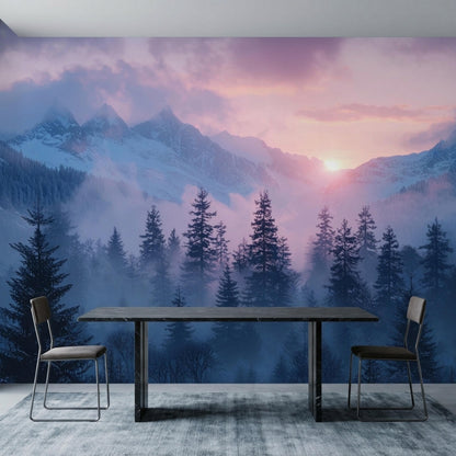 A dark dining table and two chairs rest on a grey rug against a misty mountain and pine tree wall mural.