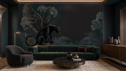 A contemporary lounge showcases a green velvet sofa and round marble coffee table against a large accent wall mural of a winged panther.