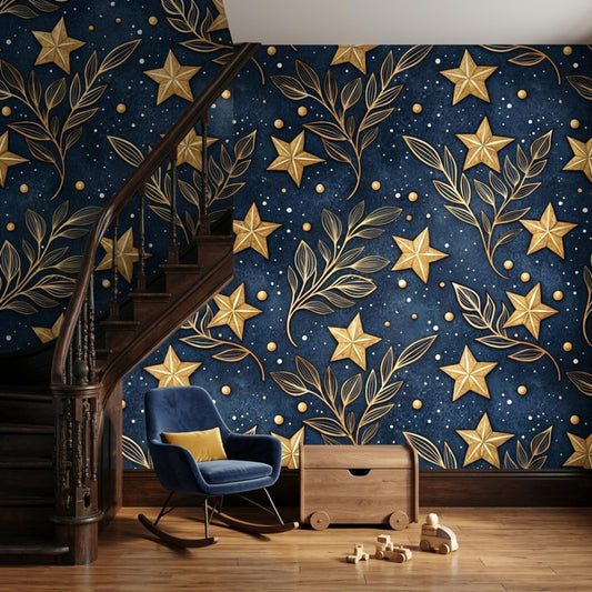 A blue rocking chair and wooden storage box are positioned against a wall covered in dark navy wallpaper with gold stars and branches.