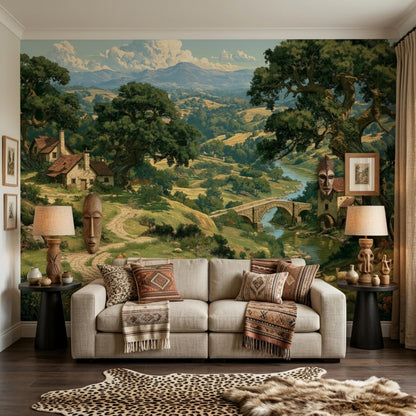 A beige sofa decorated with patterned pillows sits in front of a rustic European landscape wall mural.