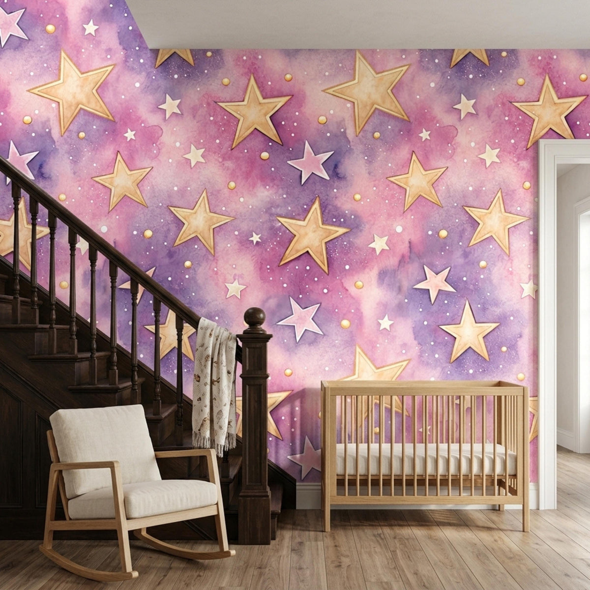 A nursery with watercolor purple and pink galaxy star wallpaper, a wooden crib, and a rocking chair.
