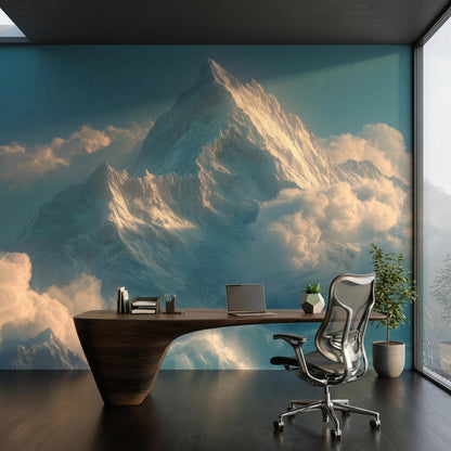 An office setup with a curved wooden desk, mesh rolling chair, and a laptop in front of a mountain wall mural.