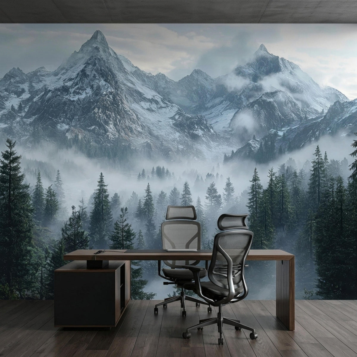 A modern office desk and ergonomic chairs sit on a wood floor in front of a misty mountain forest mural.