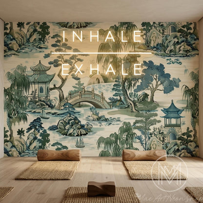 A yoga studio with a nature-themed wall mural, yoga mats, and wooden props on a light wood floor.