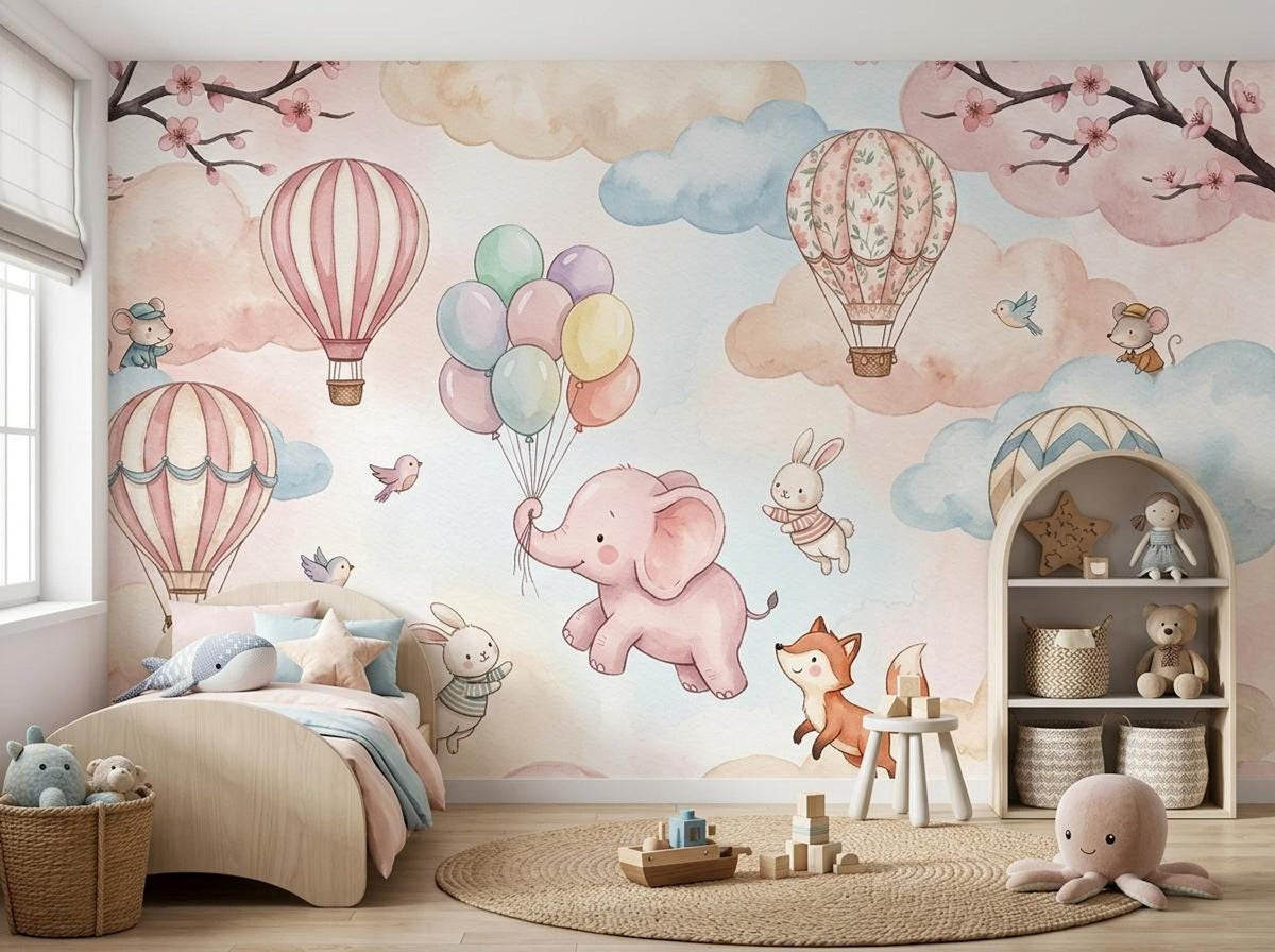 A single bed and a wooden shelving unit sit against the watercolor animal and hot air balloon mural.