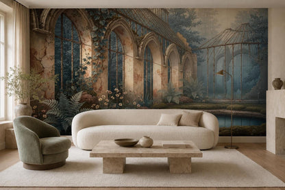 A moody blue greenhouse wallpaper mural sits behind a beige tufted sofa, wooden coffee table, and a green armchair on a rug.