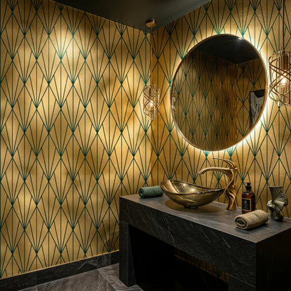 A powder room features a dark stone vanity and round mirror against gold and dark green art deco geometric wallpaper.