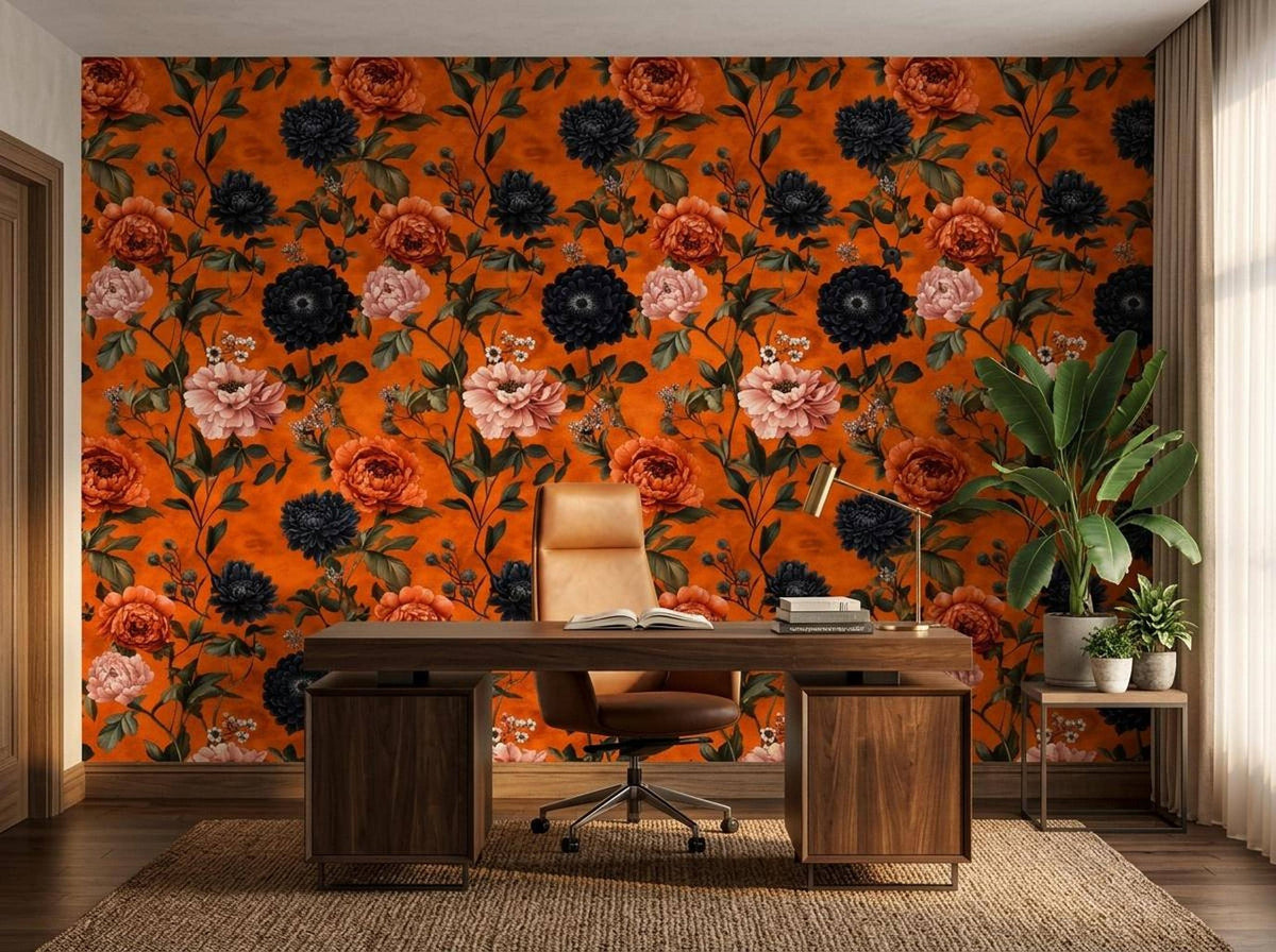 A home office setting features a brown leather desk chair and wooden desk in front of a bold orange floral wallpaper.