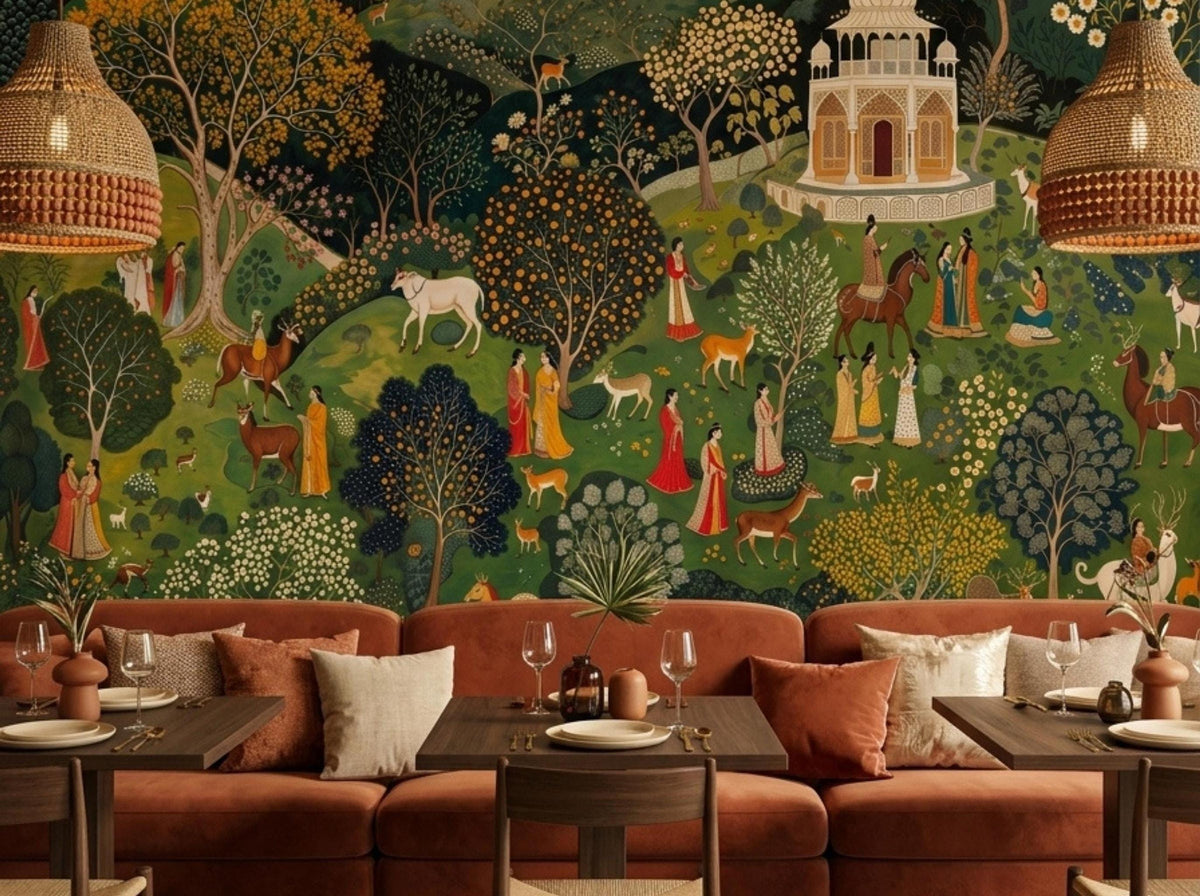 A teal Indian Pichwai wallpaper with trees and figures is displayed behind rust-colored couches and wooden dining tables.
