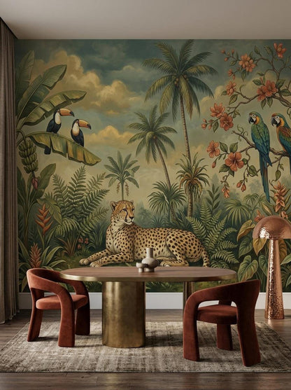 A dining space with a round table and two rust-colored velvet chairs set against a tropical jungle mural wallpaper with a cheetah.