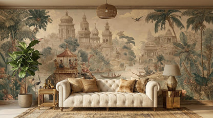 A living room shows a tufted beige sofa against a vintage Indian jungle wallpaper featuring palatial architecture and palm trees.