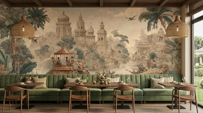 A dining space displays a long green banquette seating arrangement in front of an expansive vintage Indian mural with exotic temple scenery.