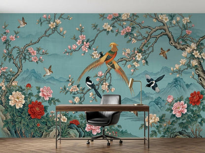 The teal floral and bird wallpaper mural shown behind a home office setup with a modern desk and black chair.
