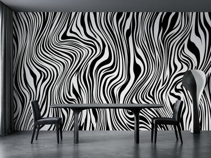 A dining space shows a black and white abstract striped wall mural behind a dark dining table and two chairs.