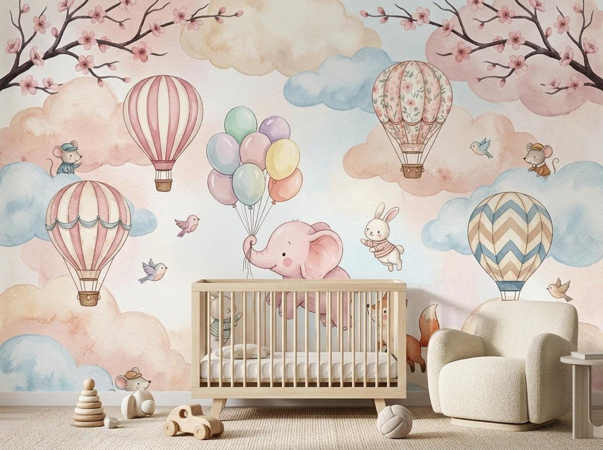 A white wooden crib sits in front of the watercolor mural, with wooden toys on the round rug below.