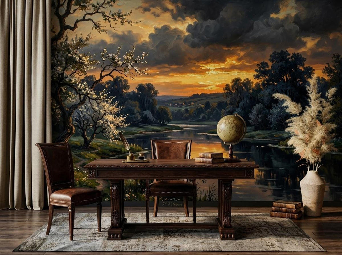 A home office features a dark wood desk and two chairs positioned against a large vintage landscape wall mural showing a river and blooming trees.