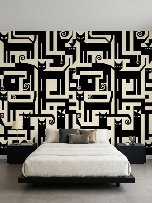 A bedroom features an accent wall covered in a black and cream geometric wallpaper with interlocking cat silhouettes behind a bed with neutral bedding.