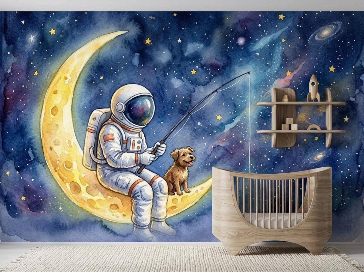 A close-up of a nursery mural in watercolor style featuring an astronaut in a spacesuit and a small dog sitting together on a crescent moon while fishing in a starry galaxy.
