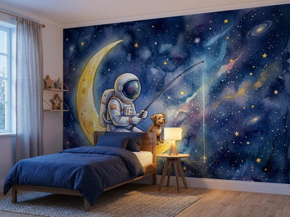 A child's bedroom features a watercolor wall mural of an astronaut and a dog fishing on the moon, alongside a single bed with a blue comforter and a nightstand.