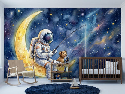 A nursery room scene with a wooden crib, a rocking chair, and a bookshelf set against a large watercolor wall mural of an astronaut and a dog fishing on a crescent moon.