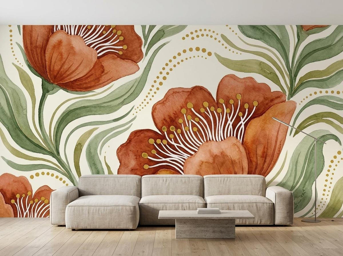 Watercolor floral wall mural with large terracotta flowers and green leaves, set in a living room with a beige sectional sofa.