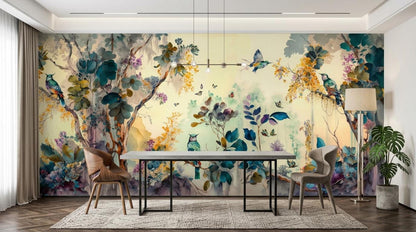 A dining room with a table, chairs, and pendant lighting set against a large watercolor nature mural wallpaper.