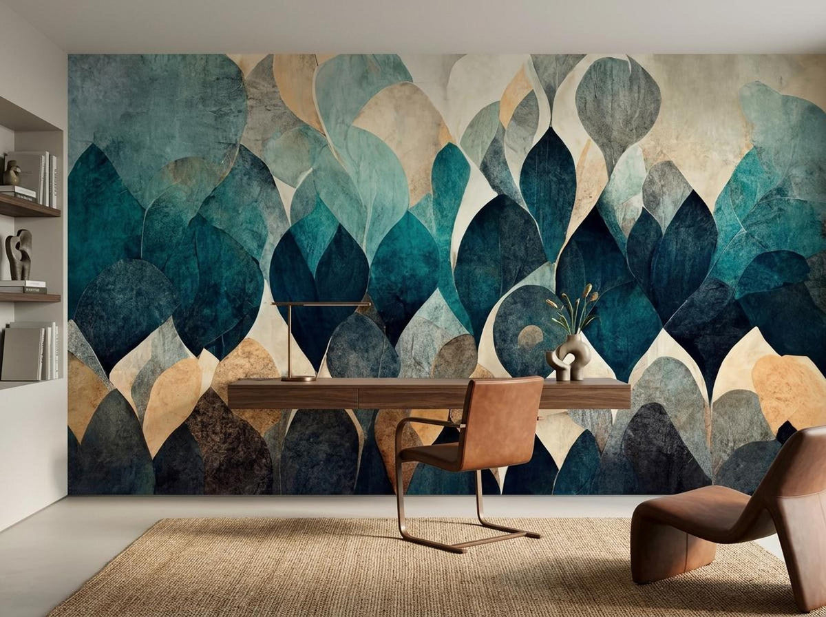 An office space with a desk and brown chair positioned before a large teal and tan leaf patterned mural.