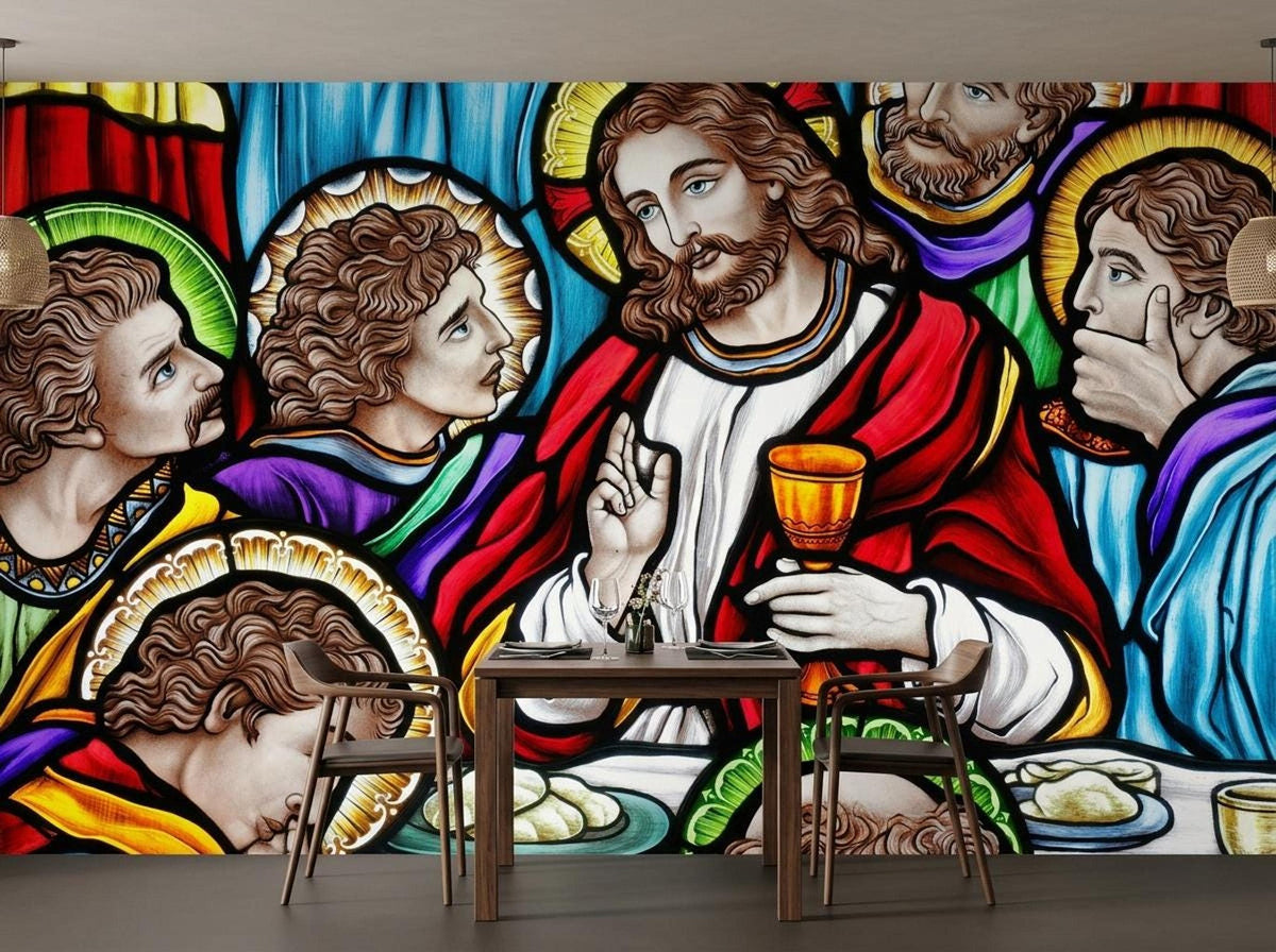 A Last Supper stained glass wallpaper mural behind a modern wooden dining table and two chairs.