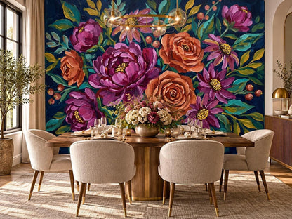 A dining room with a wooden table and cream upholstered chairs set beneath a brass chandelier against a wall featuring an impressionist floral mural.